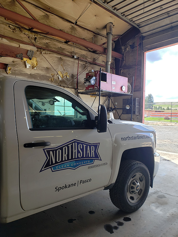 Northstar Service Truck Providing Service on Clean Burn Waste Oil Heater
