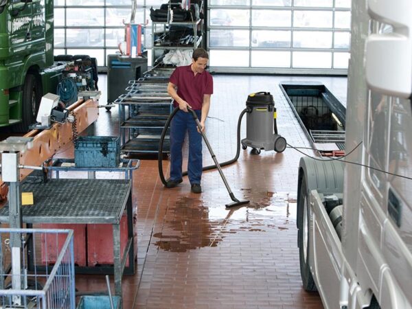 Karcher NT 48/1 Vacuuming Liquid From Truck Shop Floor
