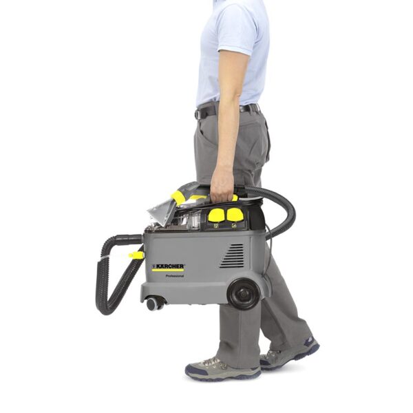 Karcher Puzzi 8/1 C Being Carried In One Hand